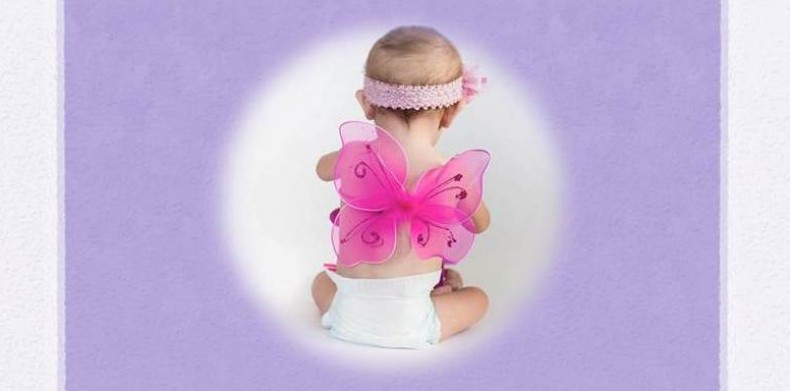 baby with butterfly wings photo